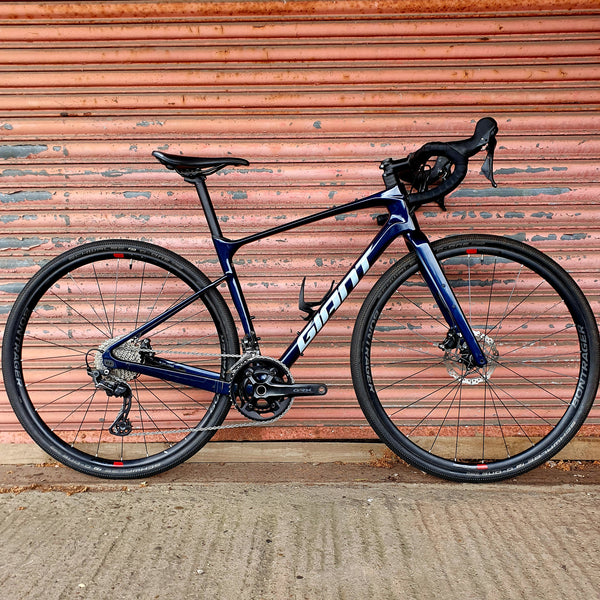 giant gravel bike uk Giant Revolt Advanced Pro GRX Disc Carbon Gravel Road Bike